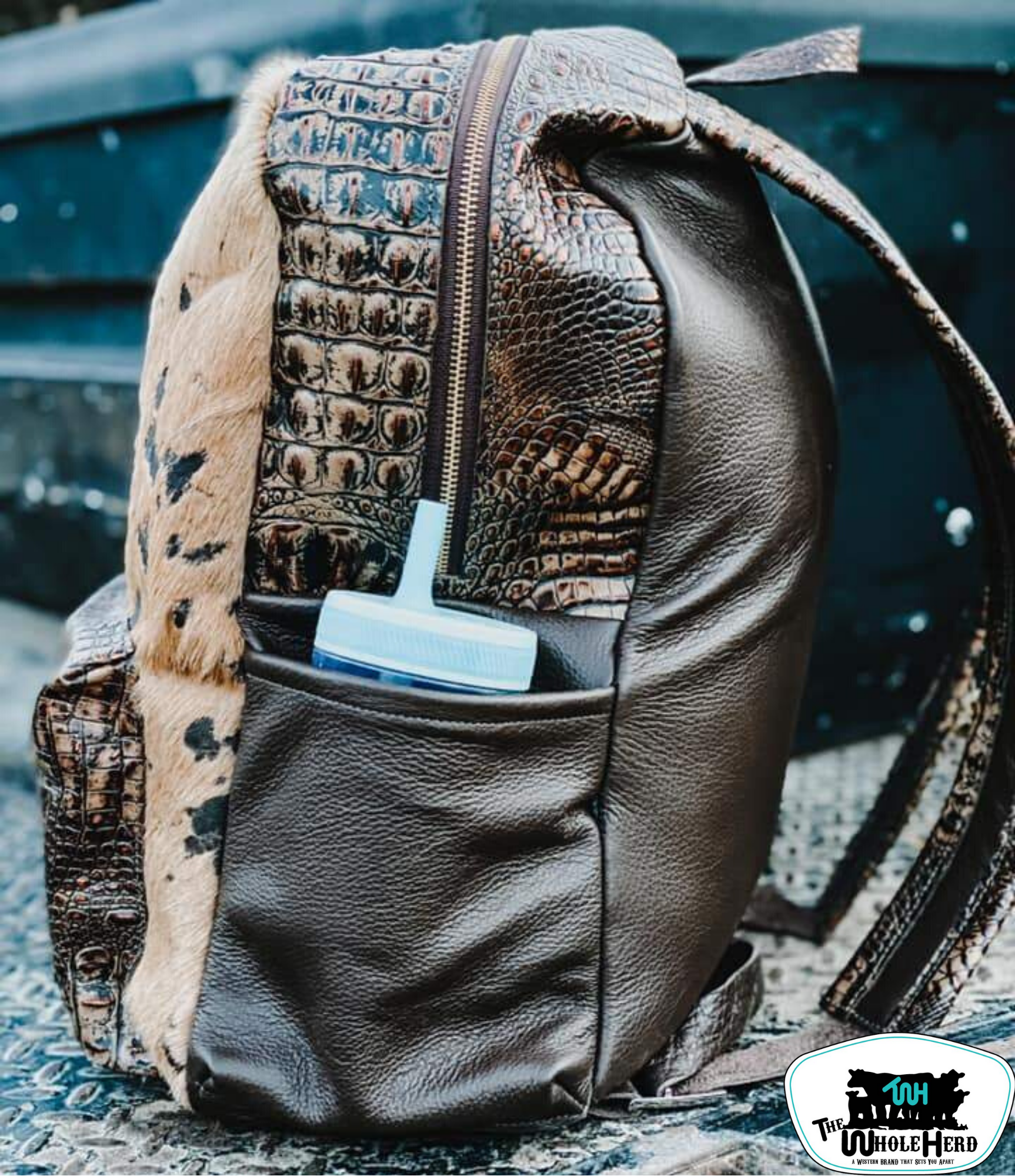 Cowhide backpack sales diaper bag